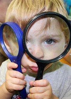 Student with 2 magnifiers