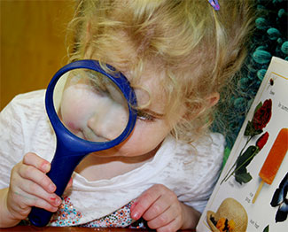 Student with magnifier